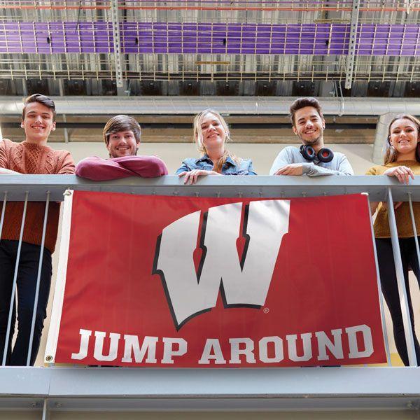 Show your team pride when you fly this Wisconsin Badgers Jump Around 3' x 5' Deluxe Flag featuring a white "W" on a red background and the words "Jump Around" in white across the bottom!
