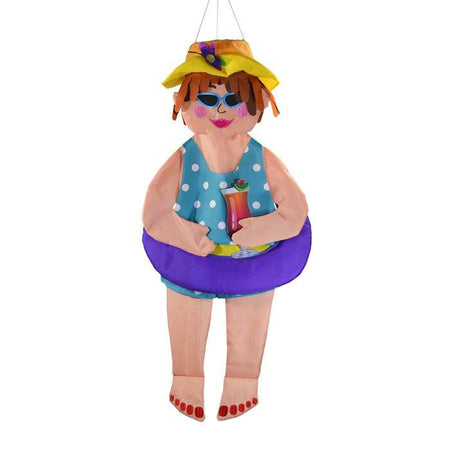The 3D Beach Bev windsock has detailed appliquéd design and embroidered accents. Measuring 31”, this windsock features a lady in a swimsuit and hat, holding a tropical drink, and wearing an inner tube around her belly.