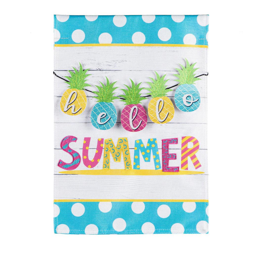 The Hello Summer Pineapple Banner garden flag features a string of brightly colored pineapples over a white background, a blue polka-dotted top and bottom border and the words "Hello Summer".