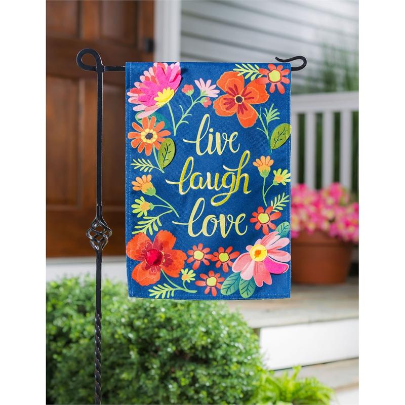 The Live Laugh Love Floral garden flag features brightly colored, beautiful flowers on a blue background. 