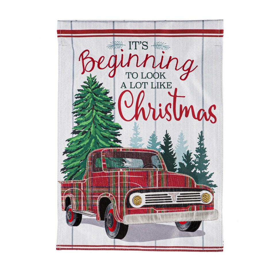 The Plaid Christmas Truck house banner features a vintage plaid truck, pine trees, and the words "It's Beginning to Look a Lot Like Christmas".