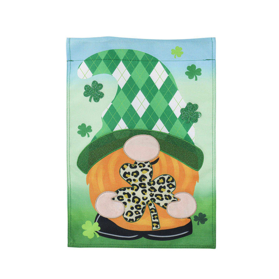 The St. Patrick's Patterned Gnome garden flag features a gnome sporting an green argyle hat and holding a leopard print clover.