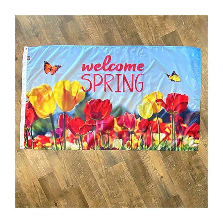 Our Welcome Spring 3' x 5' Flag features colorful tulips, butterflies, and a "Welcome Spring" message on a sky blue background.