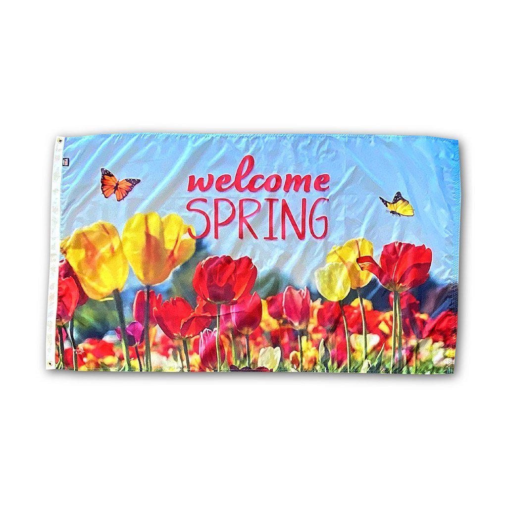 Our Welcome Spring 3' x 5' Flag features colorful tulips, butterflies, and a "Welcome Spring" message on a sky blue background.