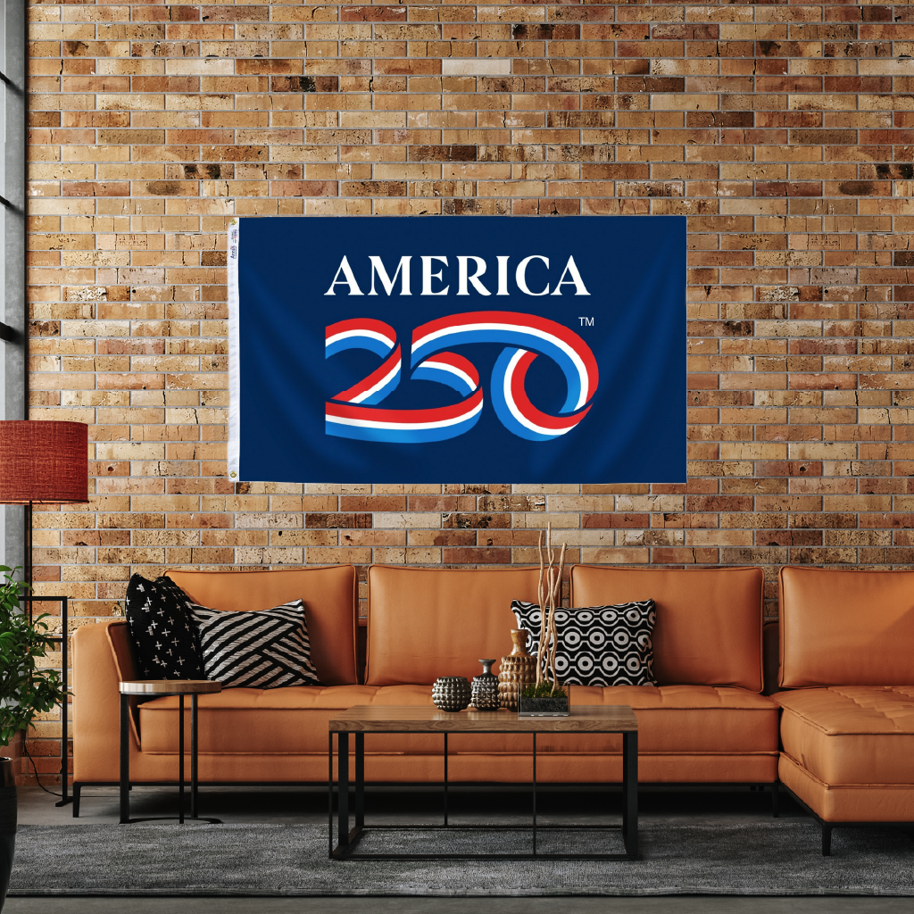 America 250 Flag hanging on a wall indoors