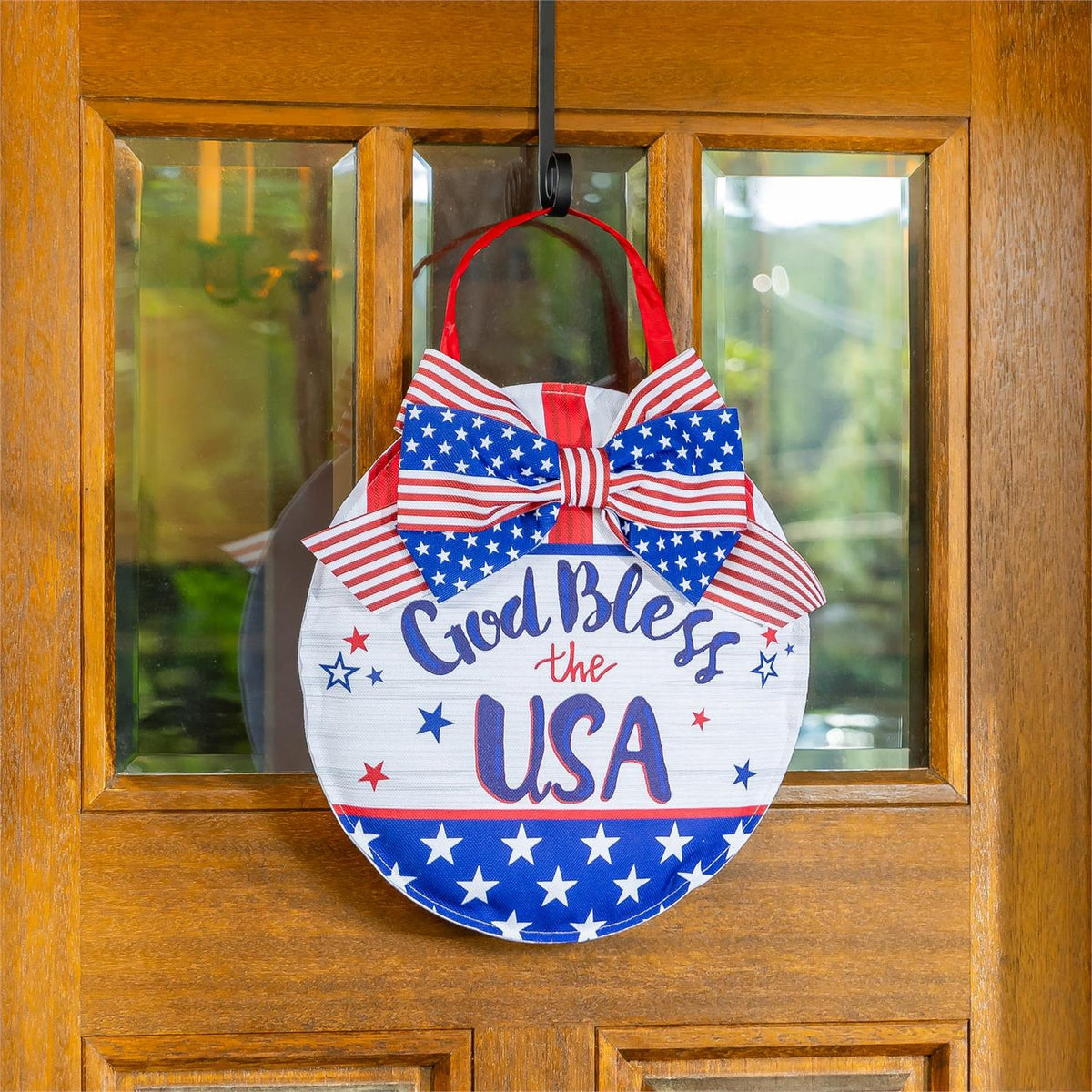 God Bless the USA patriotic fabric door decor with bow, stars, and stripes