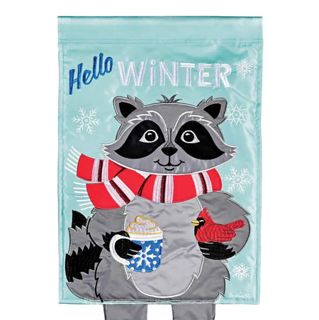 Crazy Leg Raccoon Garden Flag Features a Raccoon Wearing a Red Scarf Holding a Cup Of Hot Cocoa With The Words Hello Winter