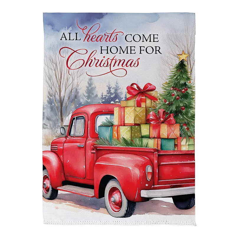 Home For Christmas Garden Flag Features a red truck with presents stacked in the back and the words "all hearts come home for christmas"
