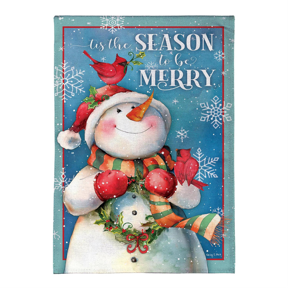 Merry Snowman With Cardinal Garden Flag Features a Snowman holding a wreath with the words " tis the season to be merry"