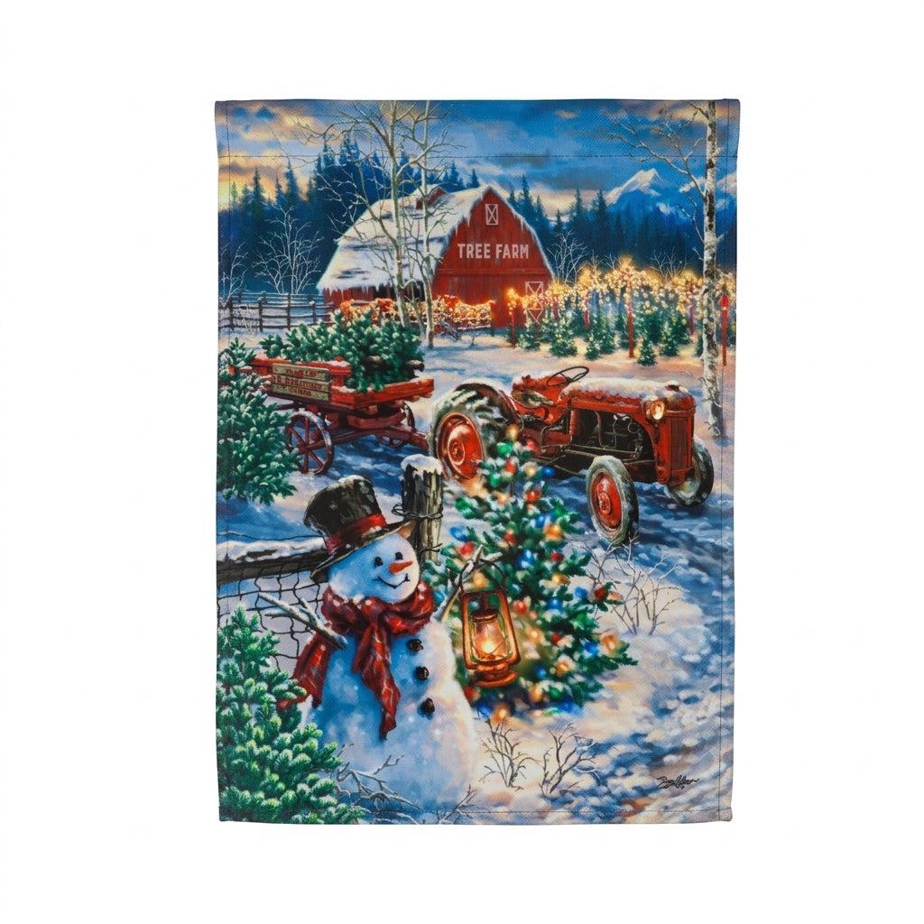 Tree Farm Solar LED Garden Flag Features a red barn, a Snowman, Christmas trees and a red tractor 