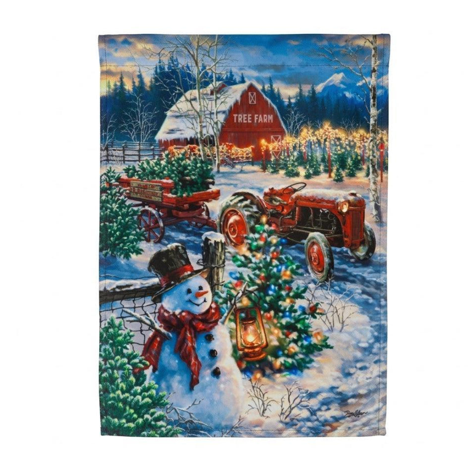 Tree Farm Solar LED Garden Flag Features a red barn, a Snowman, Christmas trees and a red tractor 