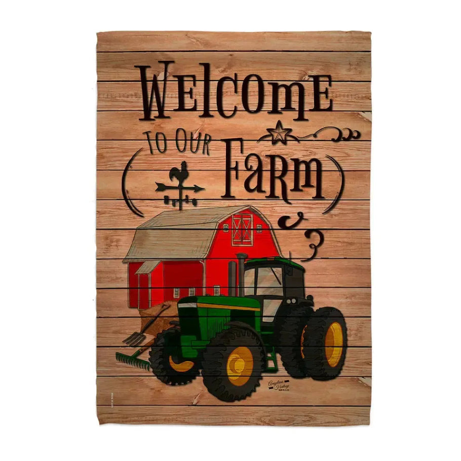 This garden flag features a barn & tractor with the words welcome to our farm 