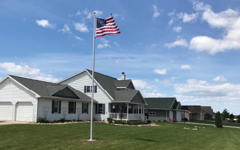 A replumbed flagpole flies the U.S. flag