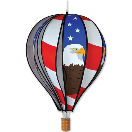This hanging wind spinner looks just like a hot air balloon in flight! The Patriotic Eagle balloon features stars, stripes, and eagles. It measures 15" x 22" and adds a beautiful display to your deck or porch.