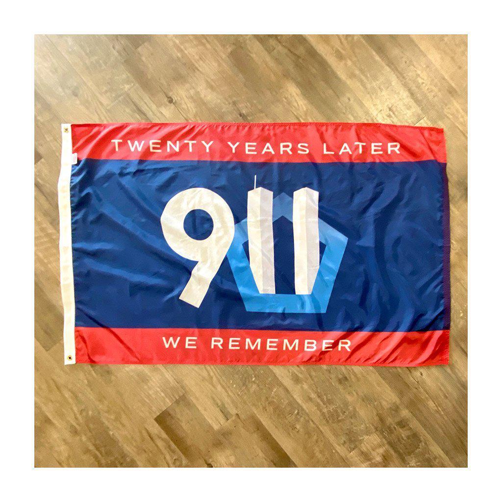 Image features twin towers and the pentagon and the words "Twenty Years Later We Remember".