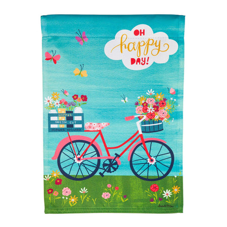 The Bike Ride Blooms garden flag features a pink bicycle with baskets full of flowers and the words" Oh Happy Day".