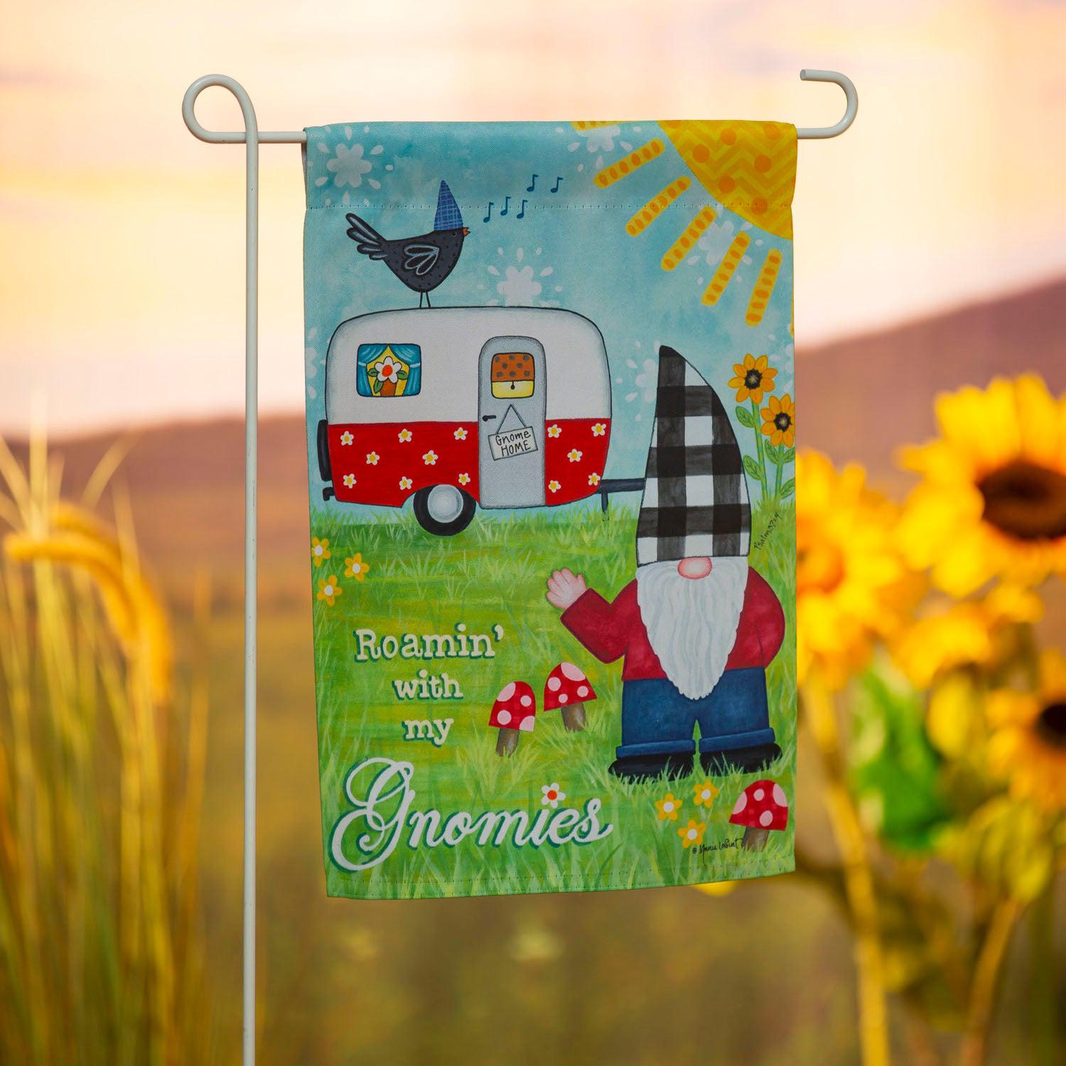 The Camping Gnome garden flag features a waving gnome with a retro camper and the words" Roamin' with my Gnomies". 