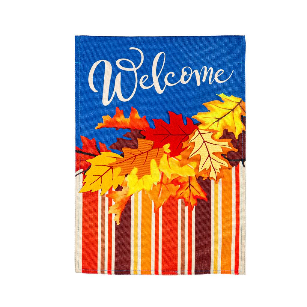 The Cascading Leaves garden flag features bright fall leaves with coordinating stripes and the word "Welcome" across a vivid blue top. 
