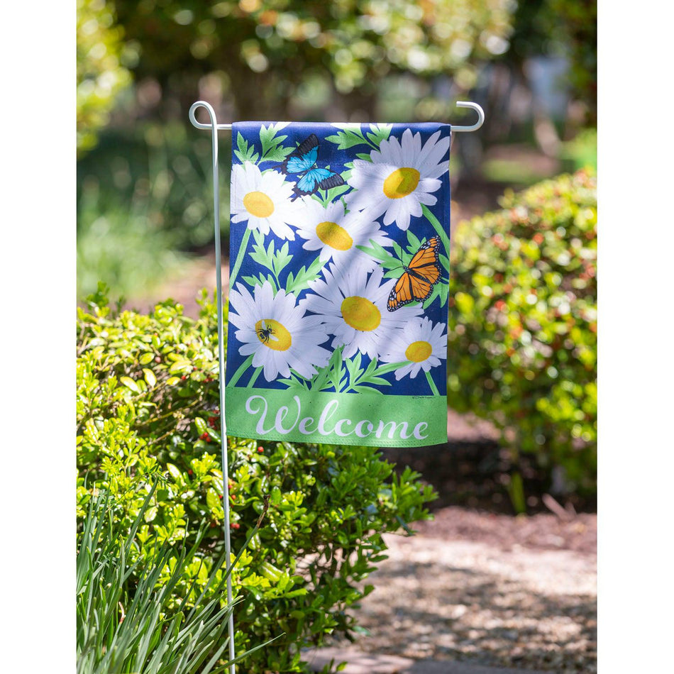The Daisy Garden garden flag features bright white daisies with butterflies and the word "Welcome" across the bottom. 