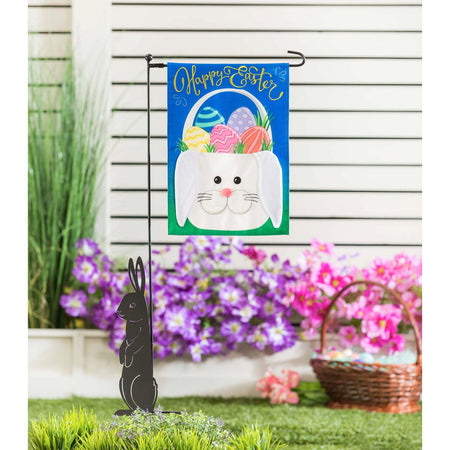 The Easter Bunny Basket garden flag features multi-colored Easter eggs in a white bunny basket and the words "Happy Easter ".  This flag is constructed of high quality durable burlap fabric with 3D appliqué details. 
