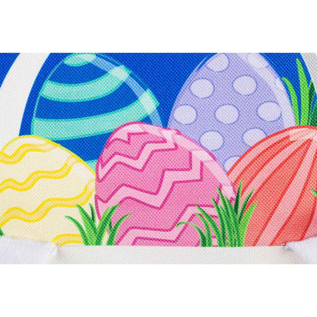 The Easter Bunny Basket house banner features multi-colored Easter eggs in a white bunny basket and the words "Happy Easter ".  This flag is constructed of high quality durable burlap fabric with 3D appliqué details. 