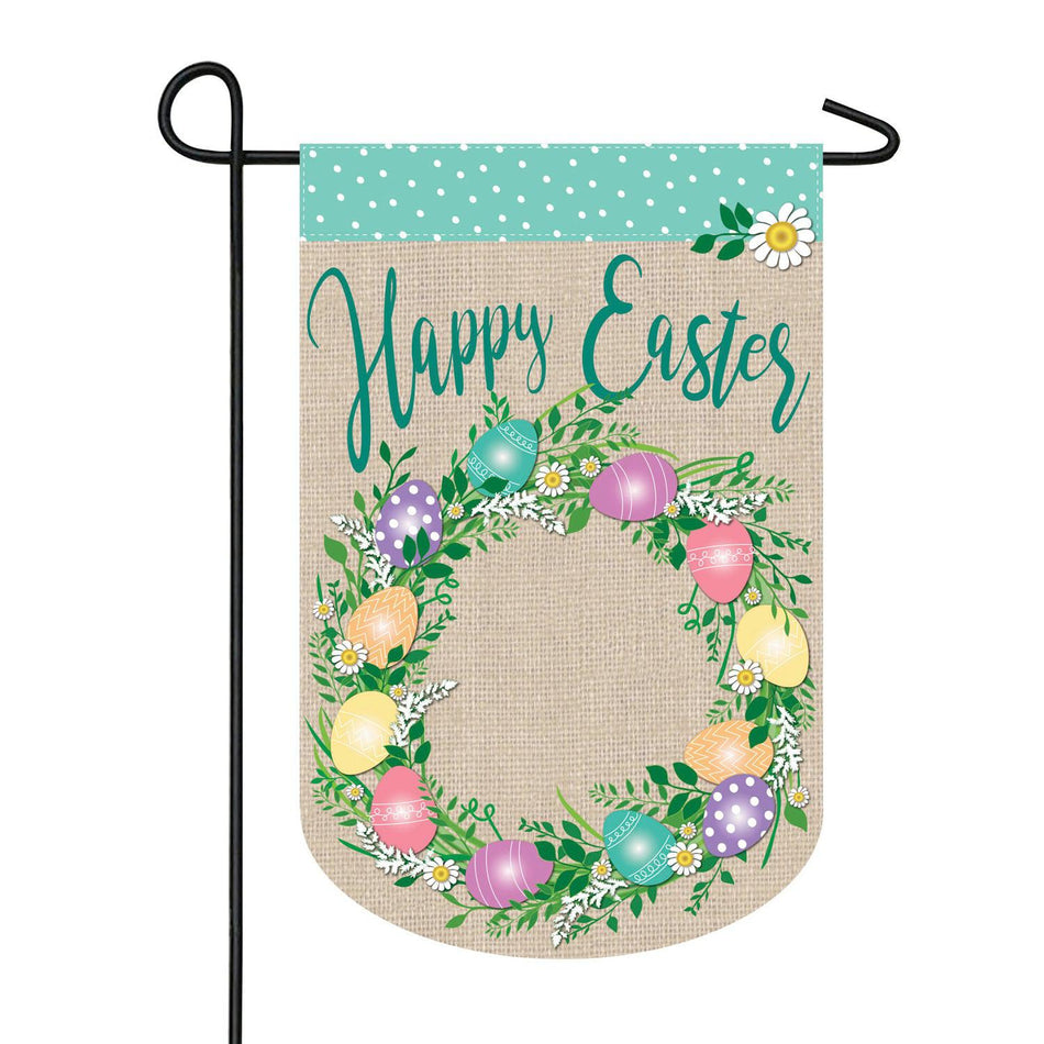The Easter Egg Wreath garden flag features a colorful wreath of eggs, a polka-dot top border along with the words "Happy Easter ". 