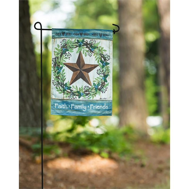 The Faith Family Friends Country Star garden flag features a country star surrounded by a wreath as well as the words "Faith Family Friends" across the bottom of the flag.