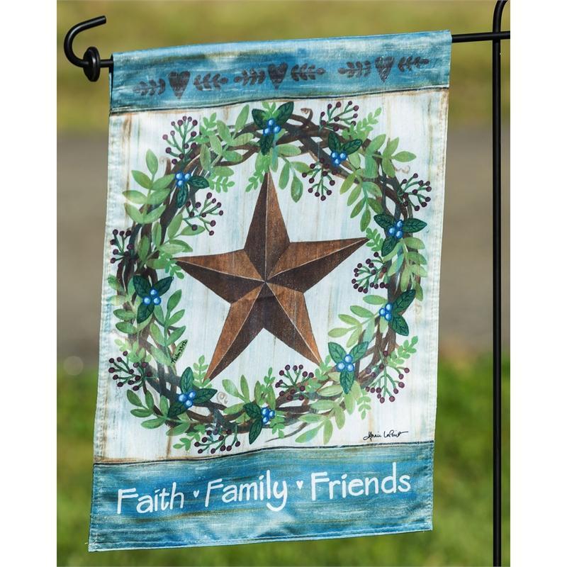 The Faith Family Friends Country Star garden flag features a country star surrounded by a wreath as well as the words "Faith Family Friends" across the bottom of the flag.