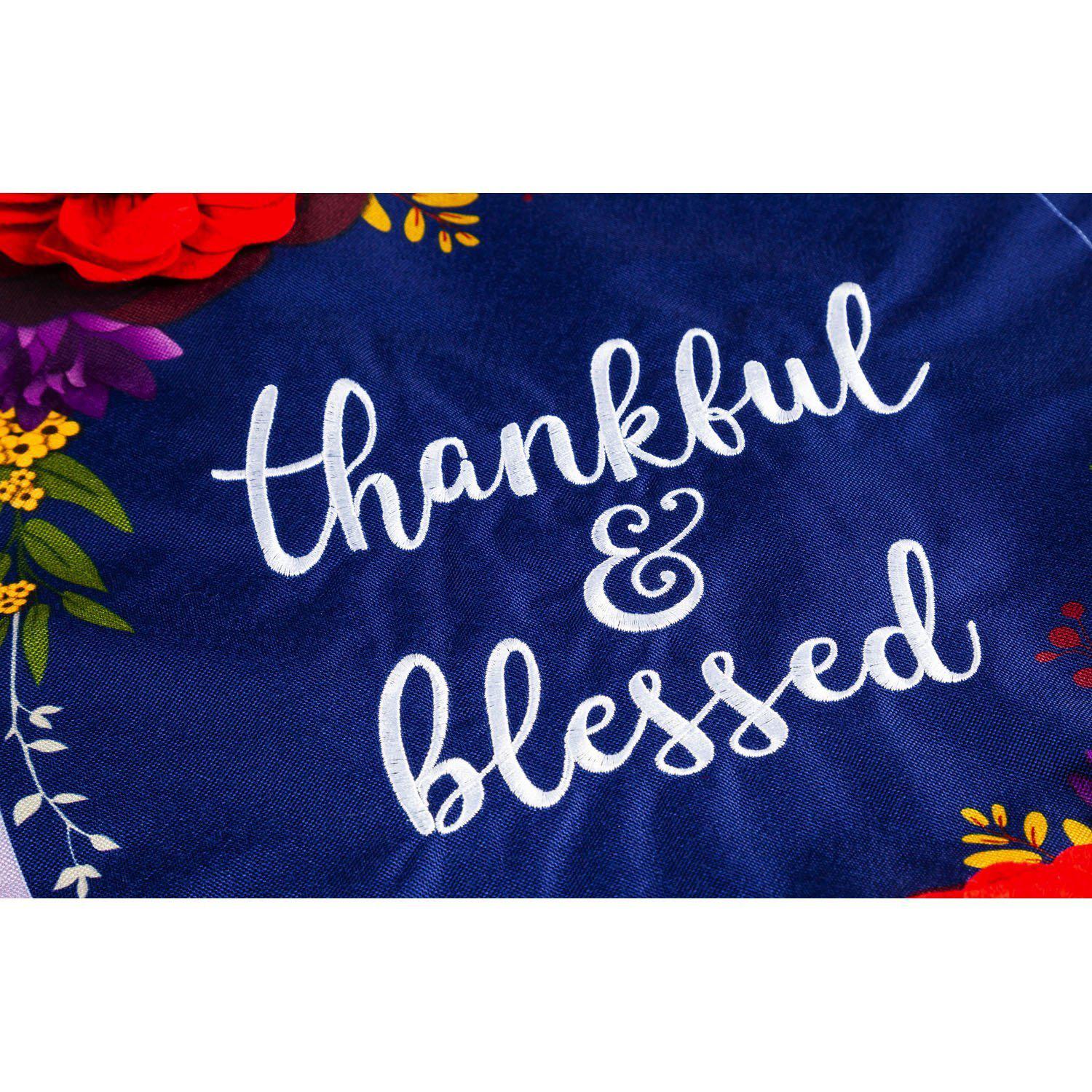 The Fall Floral Check garden flag features a red floral and navy checked background with the words "Thankful and Blessed".