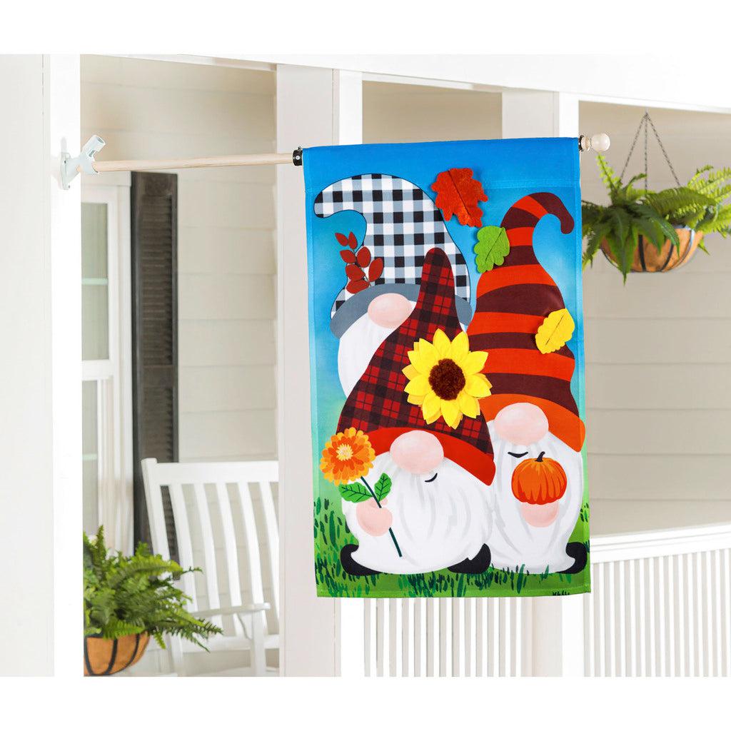 The Fall Gnome Trio house banner features three gnomes with fall inspired caps, flowers, and leaves.