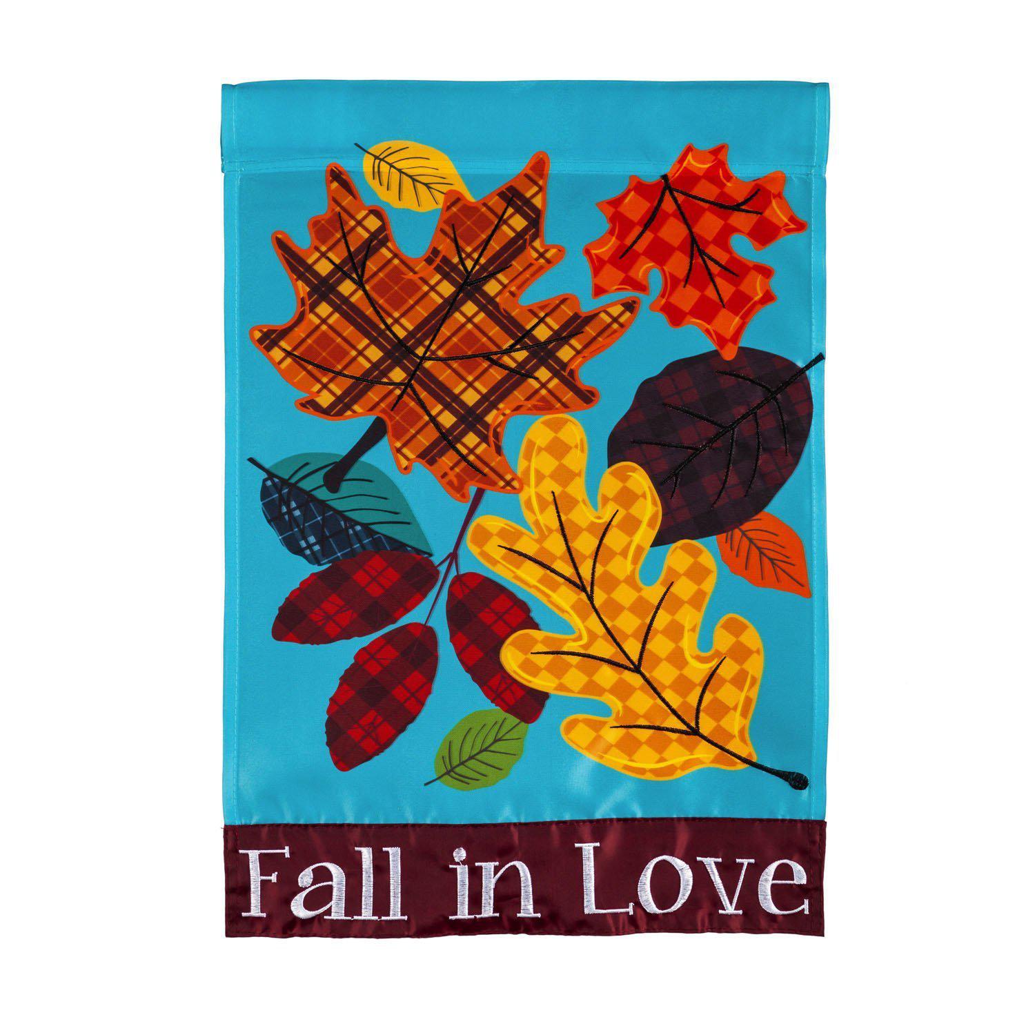 The Fall in Love Plaid Leaves garden flag features an array of patterned, brightly colored fall leaves along with the words "Fall in Love".