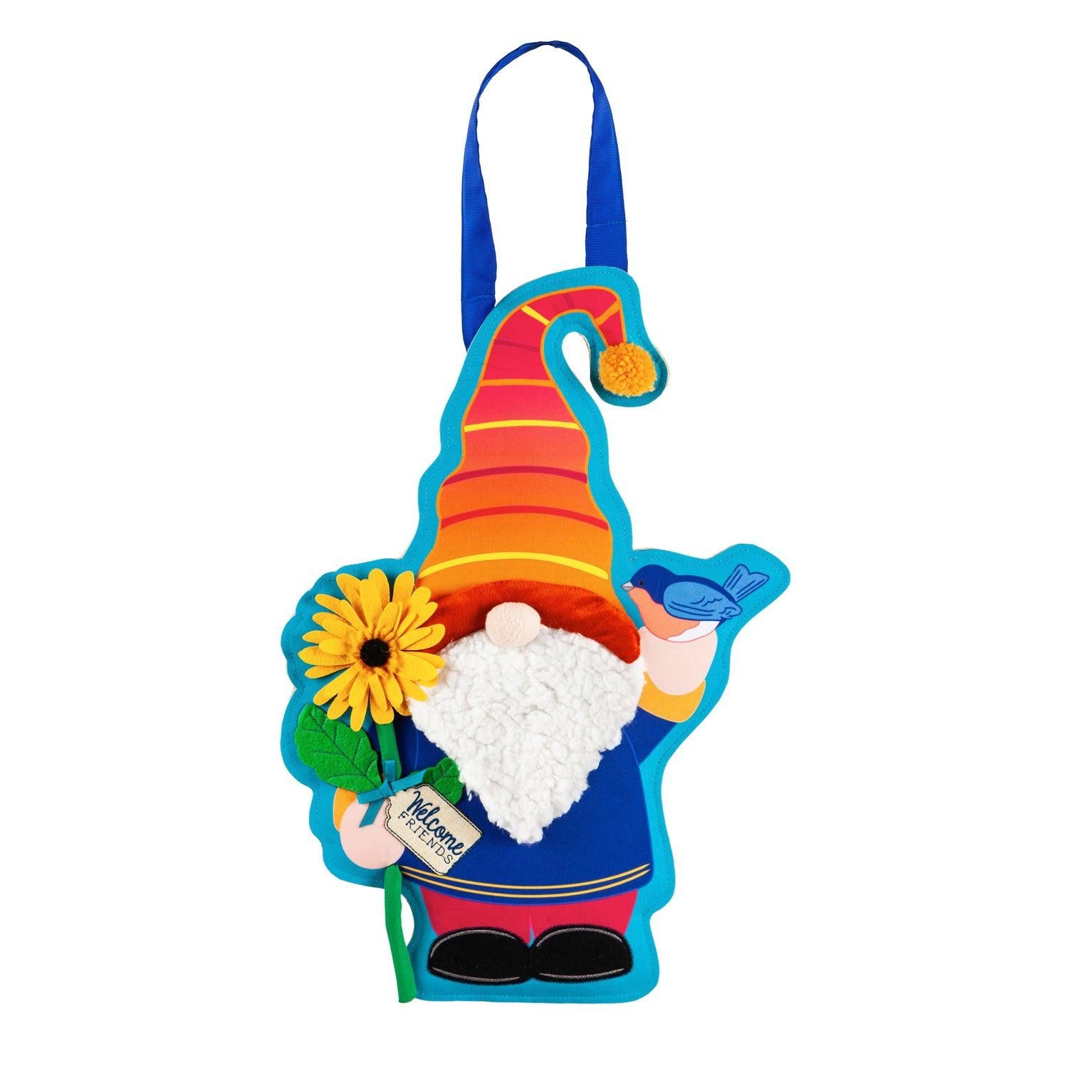 The brightly colored Garden Gnome door décor features a charming gnome standing among flowers while holding a flower and a bluebird. 
