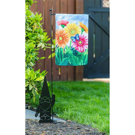 The Gerbera Daisies garden flag features brightly colored flowers on a sky blue background.