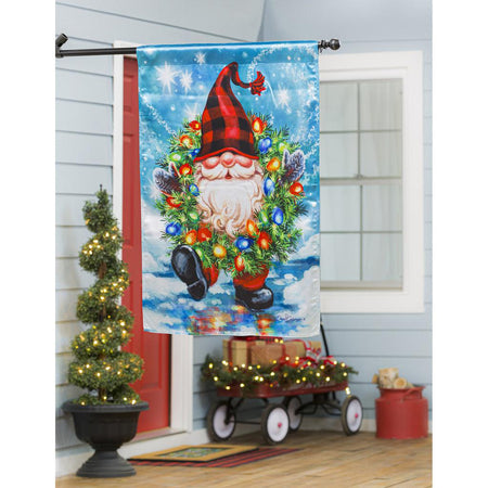 The Gnome With a Christmas Wreath house banner features a smiling gnome sporting a pine wreath decorated in Christmas lights. 