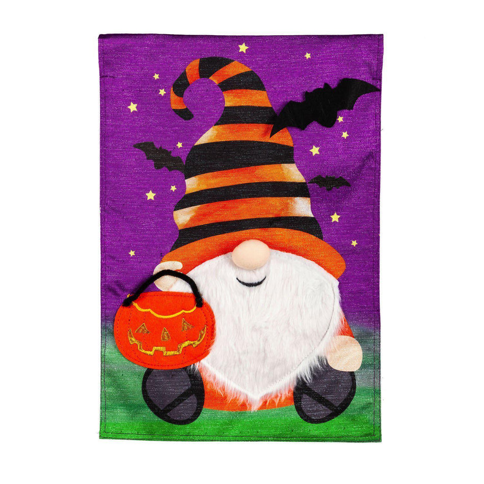 Celebrate the holiday with our Halloween Gnome Garden Flag, featuring an adorable fuzzy-bearded gnome holding a jack-o-lantern.