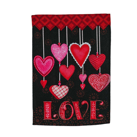 The Hanging Love Hearts garden flag features pink, white, and red patterned hearts suspended over the word "Love".