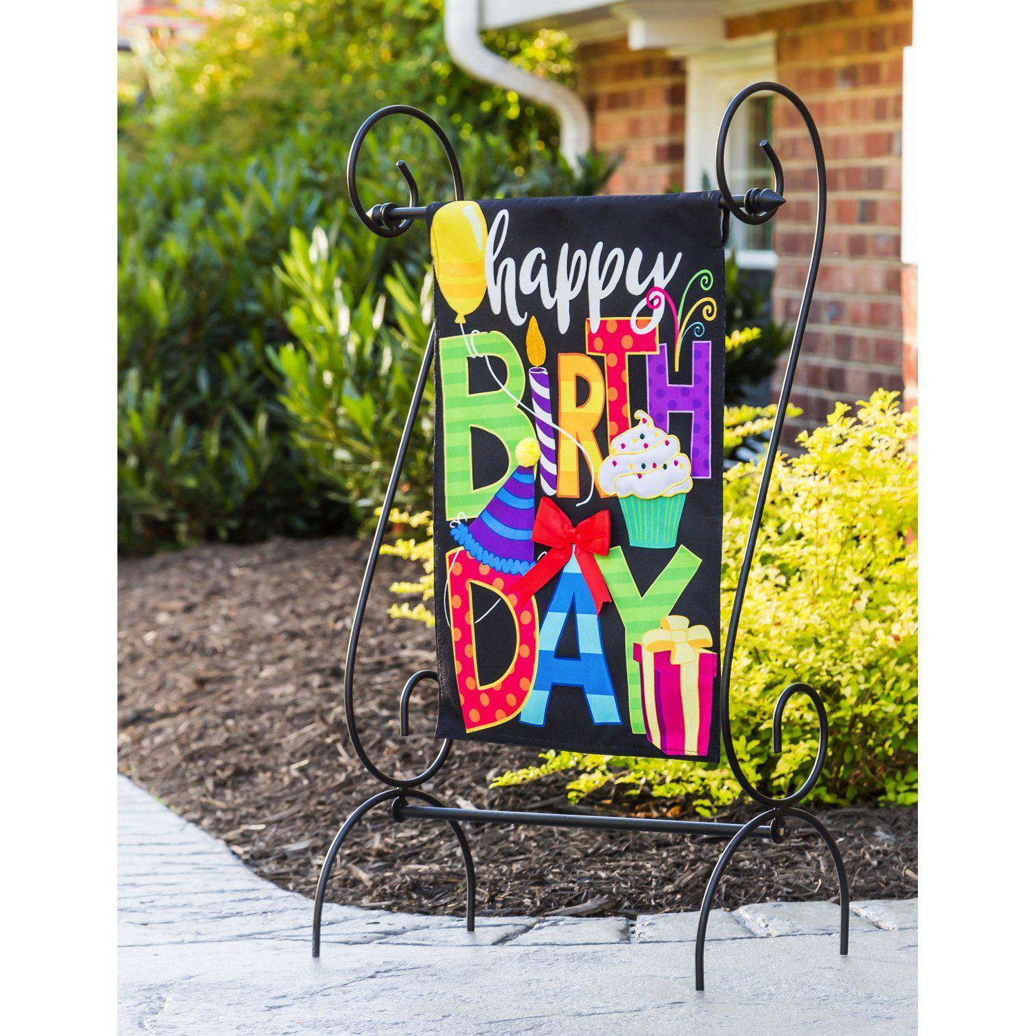 The two-sided Happy Birthday garden flag features a balloon, cupcake, candle, bow, presents, and the words "Happy Birthday"!