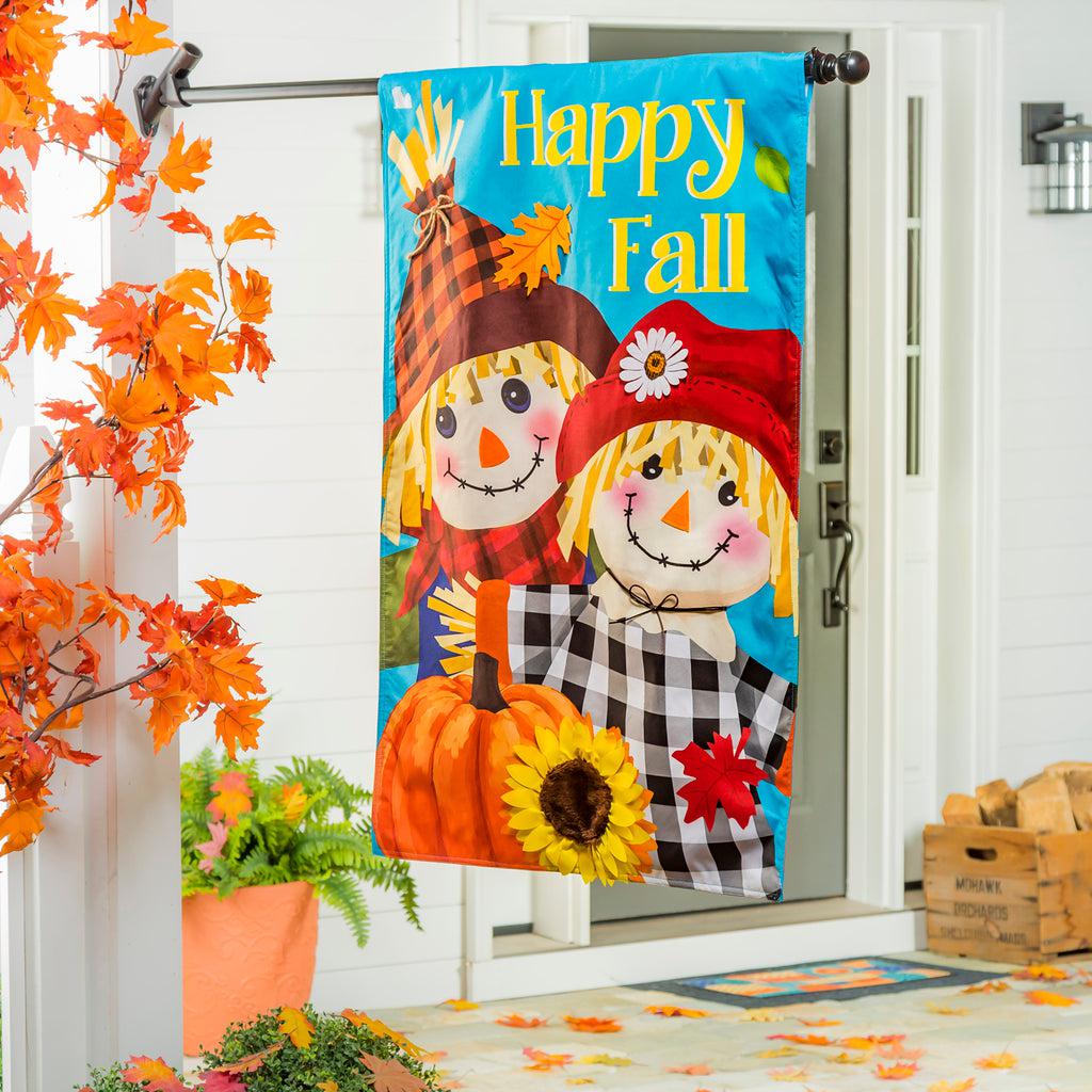 Our Happy Scarecrow Couple house banner features a pair of smiling scarecrows with a pumpkin and the words "Happy Fall". 