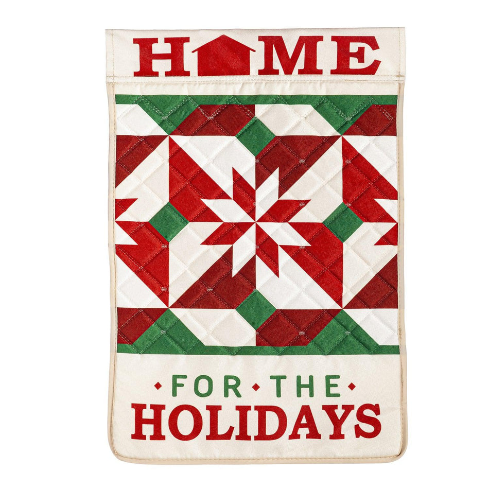 The Home for the Holidays quilted garden flag features a red, white, and green quilt design and the words "Home for the Holidays".
