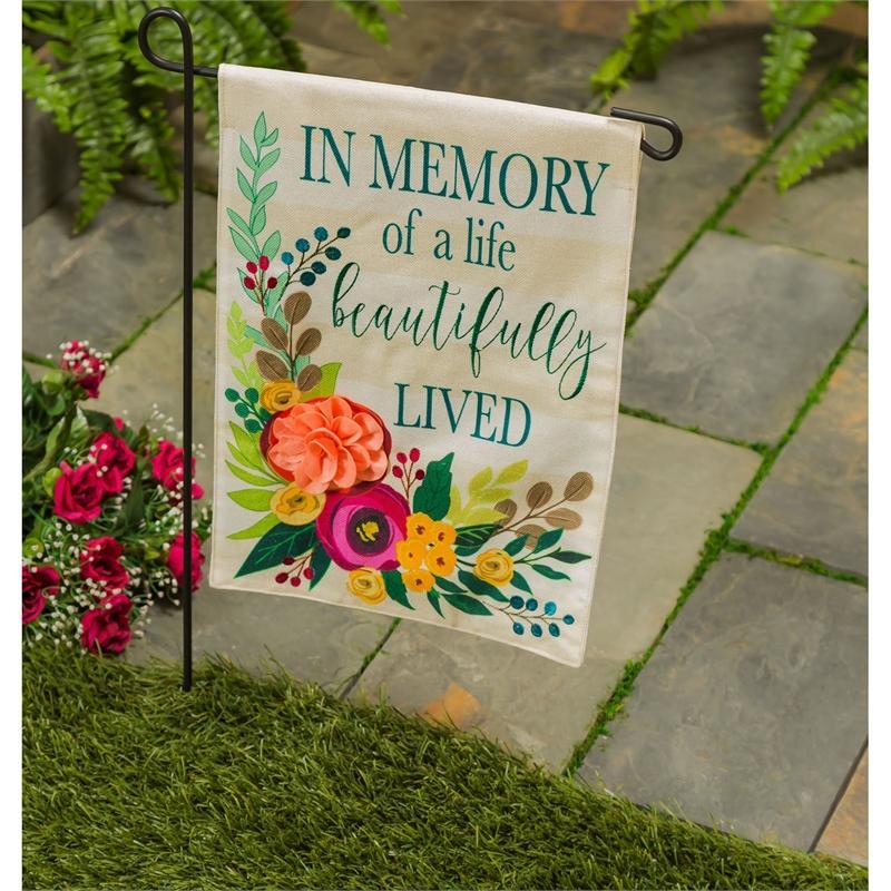 Perfect for remembering someone special, the "In Memory of a Life Beautifully Lived" garden flag features a 3D floral design on an ivory background. 