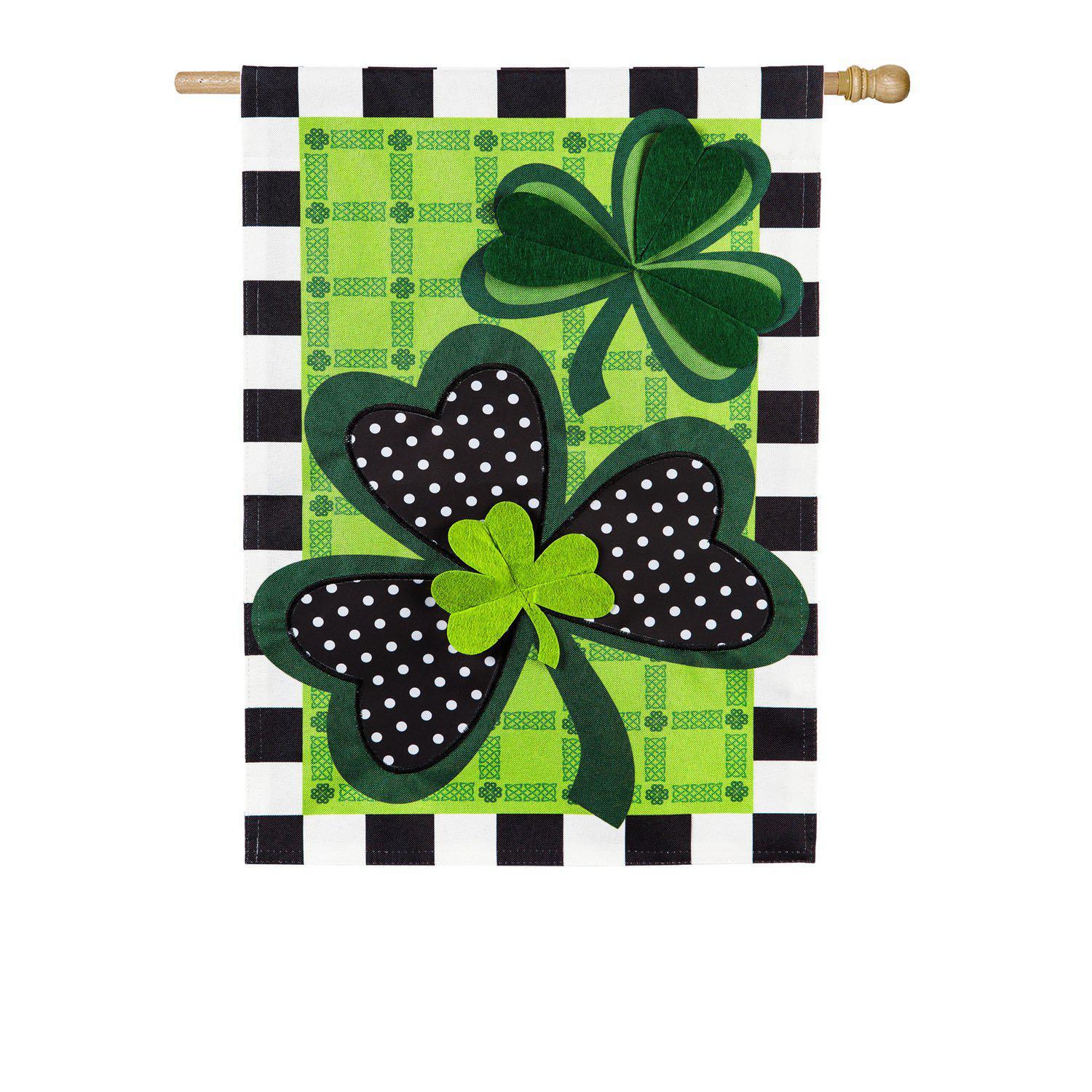 The Mixed Print Shamrocks house banner features shamrocks, plaids, polka dots and blocks in shades of green, black and white. 