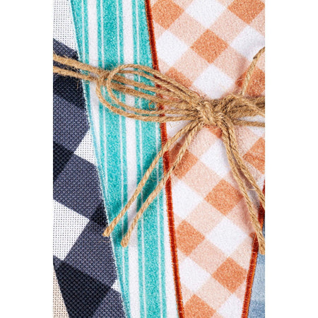 The Patterned Carrots garden flag features a bundle of multi-patterned carrots and the word "Welcome ". 