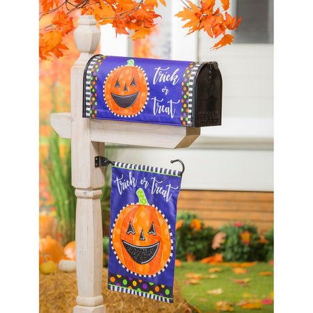 The Patterned Jack-o-Lantern garden flag features a smiling orange patterned jack-o-lantern over a purple background and the words "Trick or Treat". 