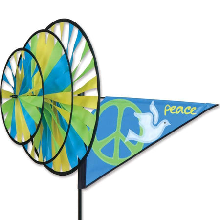 This triple spinner features three spinning wheels and a rotating pennant a dove and peace sign. 