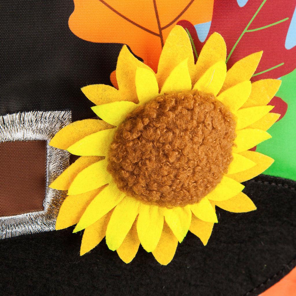 The Pilgrim Gnome garden flag features a waving gnome wearing a pilgrim hat and surrounded by pumpkins.