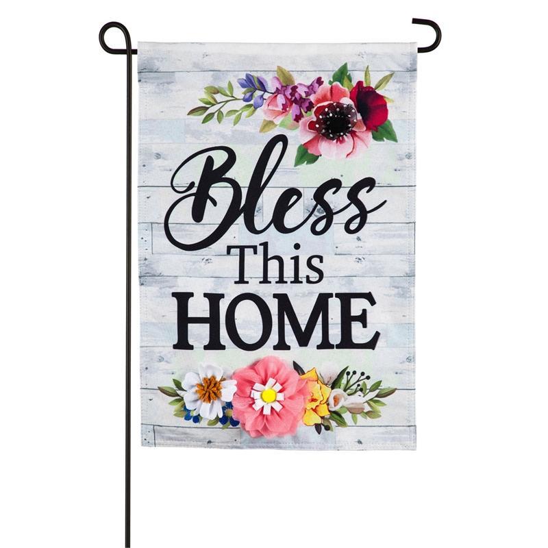 Enjoy the shiplap background and bright 3D flower accents along with the "Bless This Home" message on this colorful garden flag.