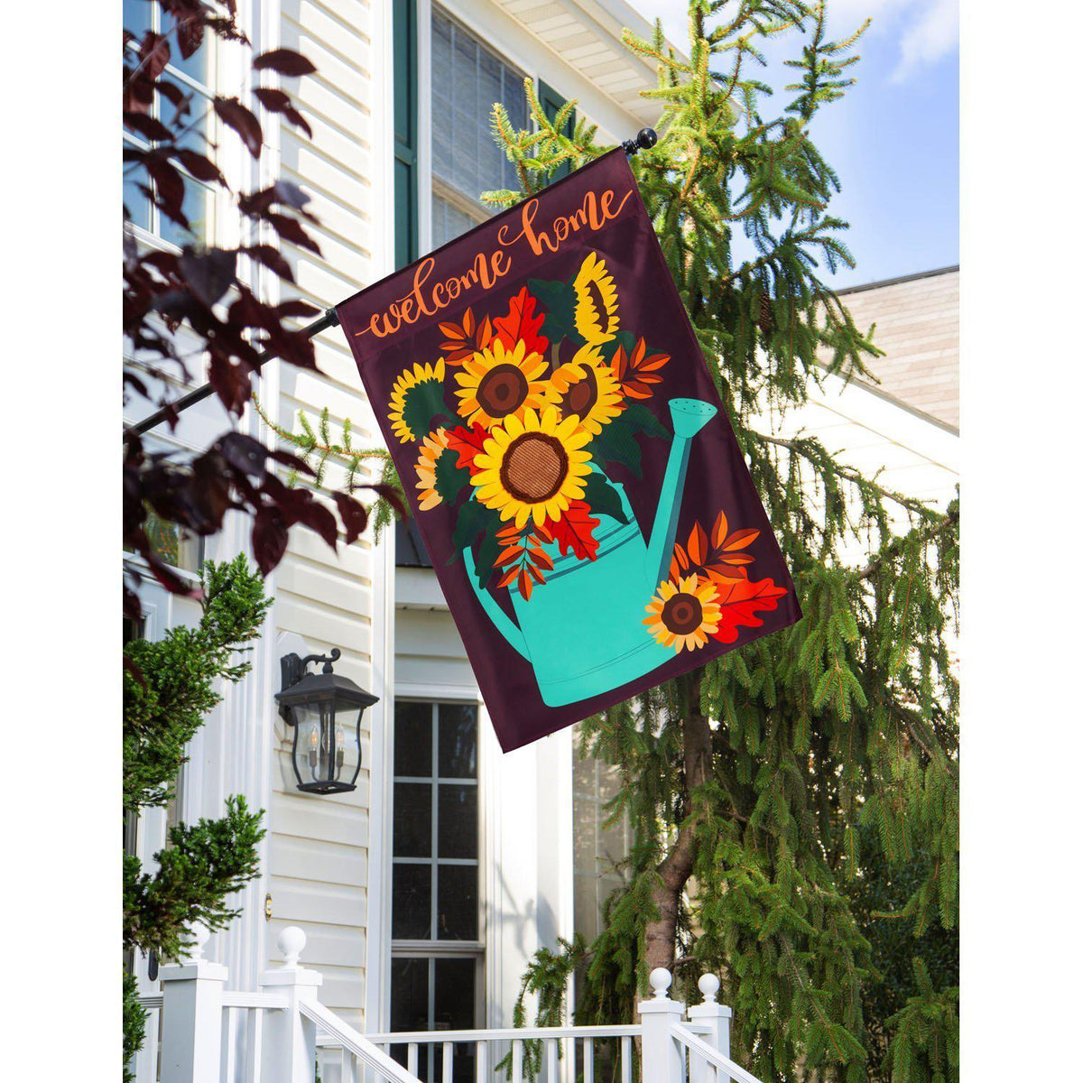 The Sunflower Watering Can house banner features a watering can filled with sunflowers and the words "Welcome Home". 