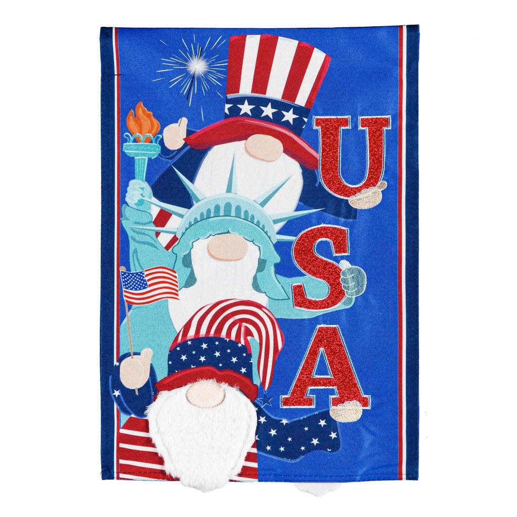The USA Gnomes garden flag features a trio of stacked, patriotic dressed gnomes each holding a letter to spell out USA.  