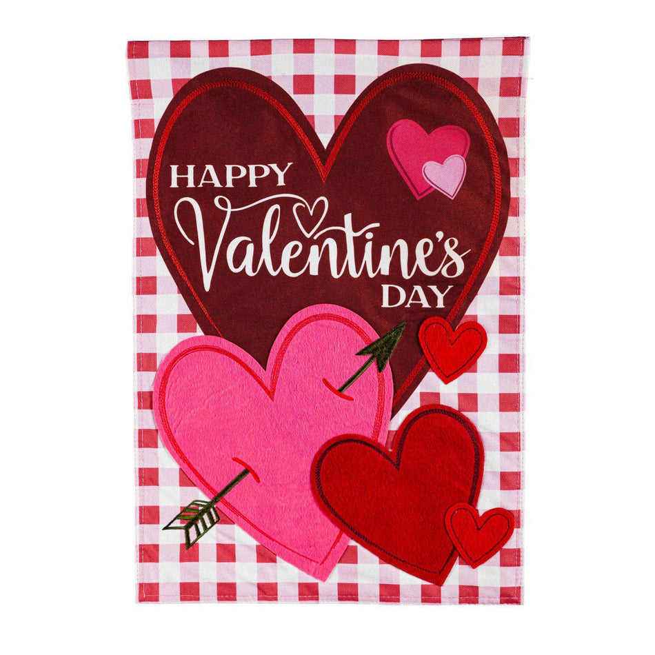 The Valentine Hearts and Checks garden flag features pink and red hearts on a checked background and the words "Happy Valentine's Day". 