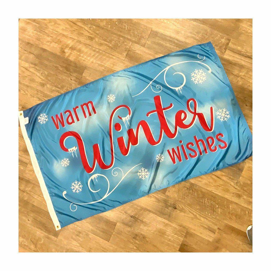 The Warm Winter Wishes 3' x 5' flag features snowflakes on a bright blue background and "Warm Winter Wishes" message.